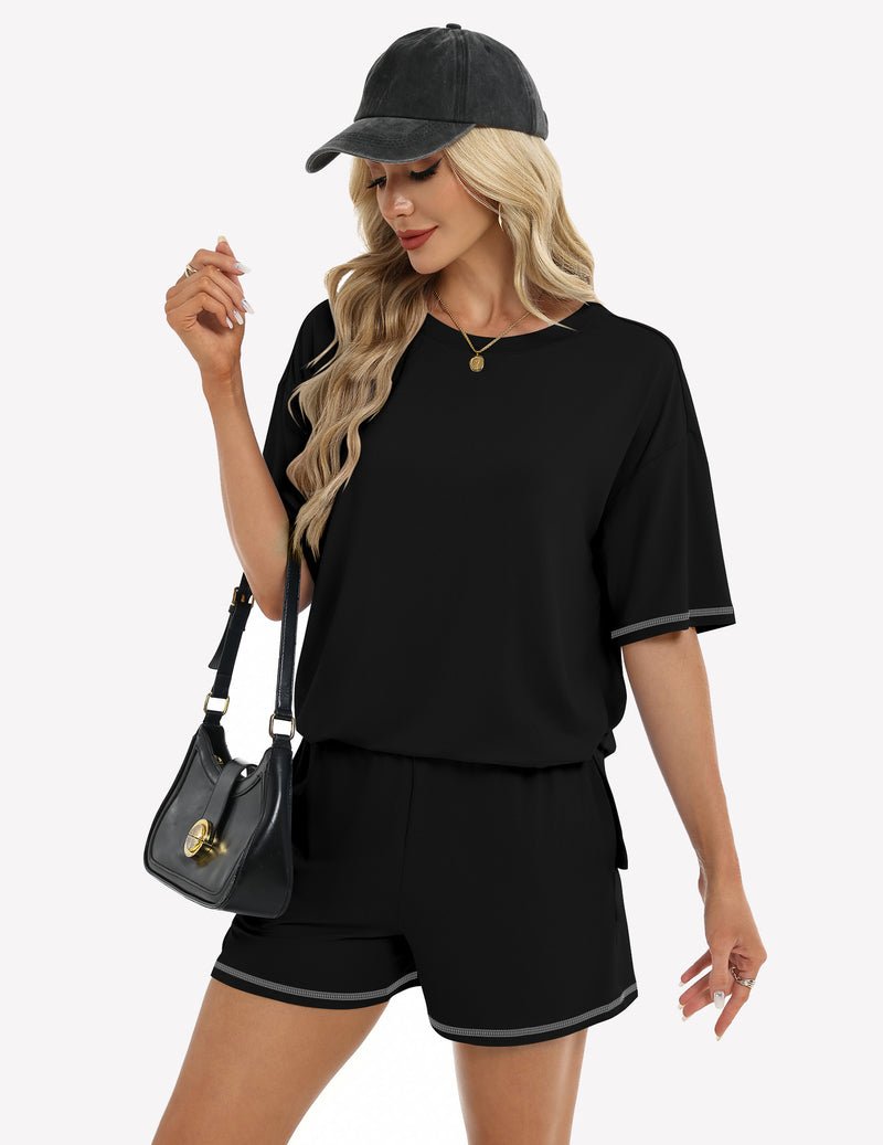 Black 2-piece shorts set: short-sleeve top and drawstring elastic-waist shorts.