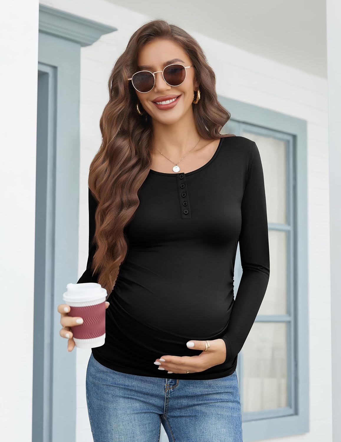 Black long-sleeve maternity henley shirt with button placket and round neckline