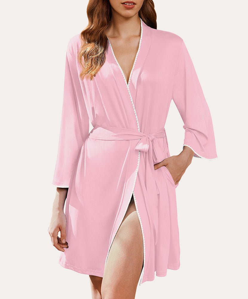 Pink 3/4 sleeve knee-length bathrobe with V-neck, tie belt, and lace-trim edges