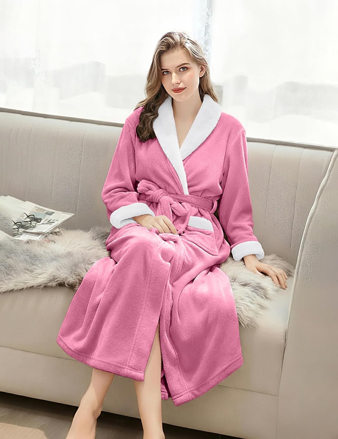 Light pink fleece bathrobe with shawl collar, belt tie, and plush trim cuffs