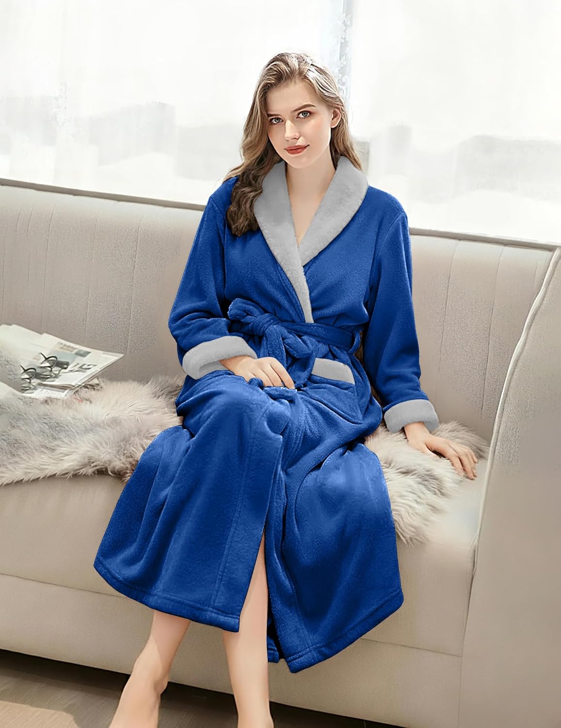 Soft long bathrobe in dark blue fleece with shawl collar and belt tie
