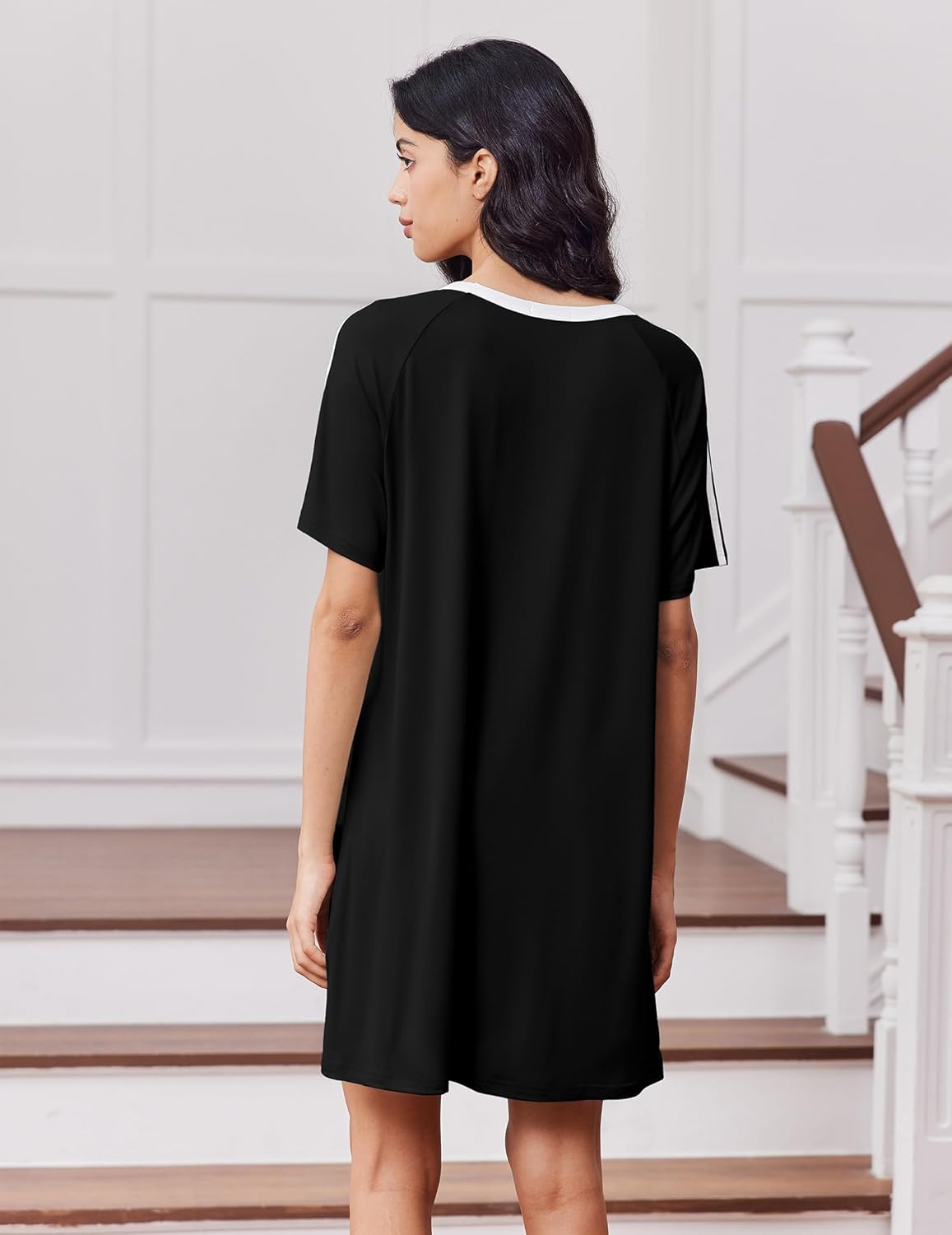 Black night dress with white crew neck and sleeve stripe accents (back view)