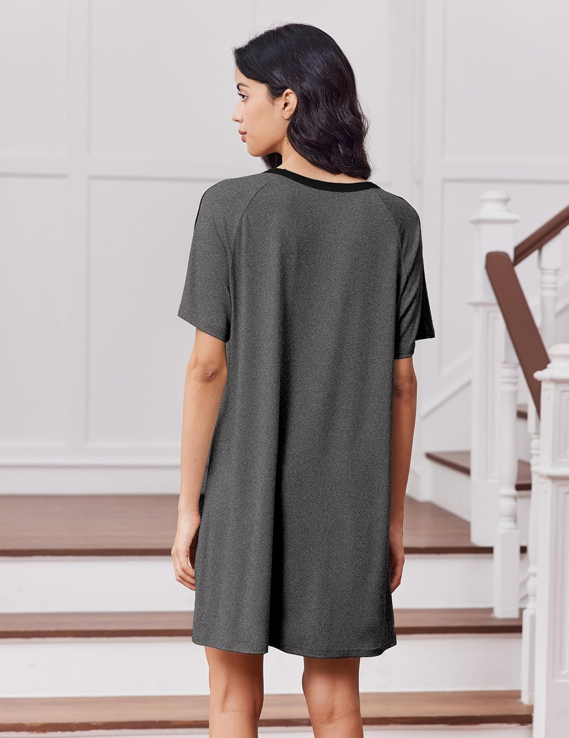 Dark gray night shirt dress with black contrast trim on crew neck and raglan sleeves (back)