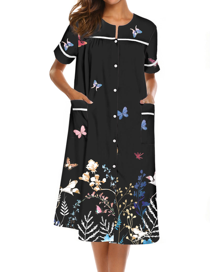 Black button-down house dress with short sleeves, butterfly print, side pockets