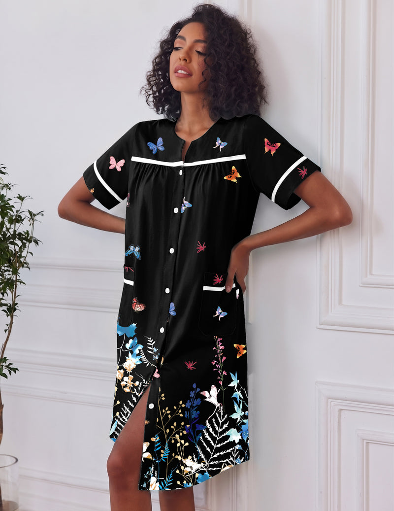 Black button-down house dress with short sleeves, colorful butterfly print, side pockets