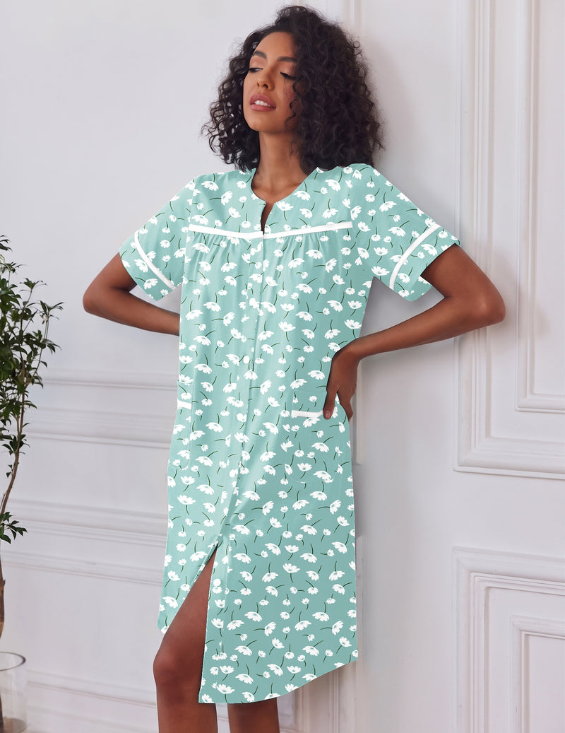 Button-down short-sleeve house dress in mint floral print with front buttons and pockets