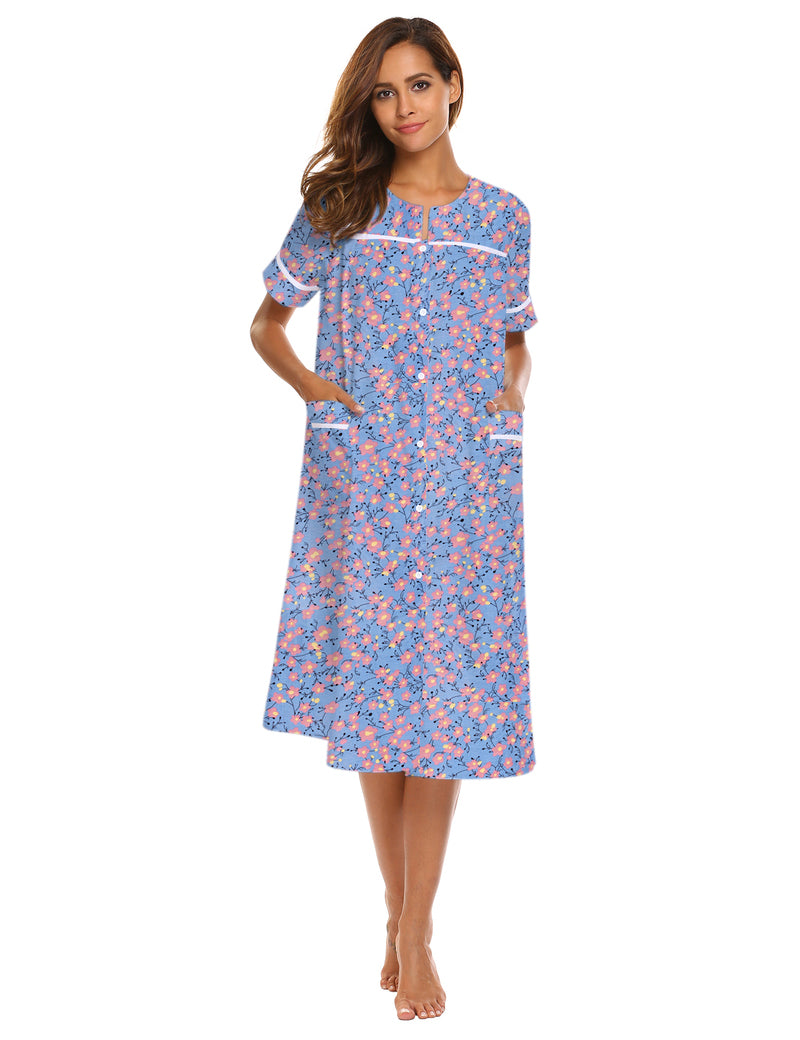 Button-down short-sleeve house dress in blue with pink floral print and side pockets