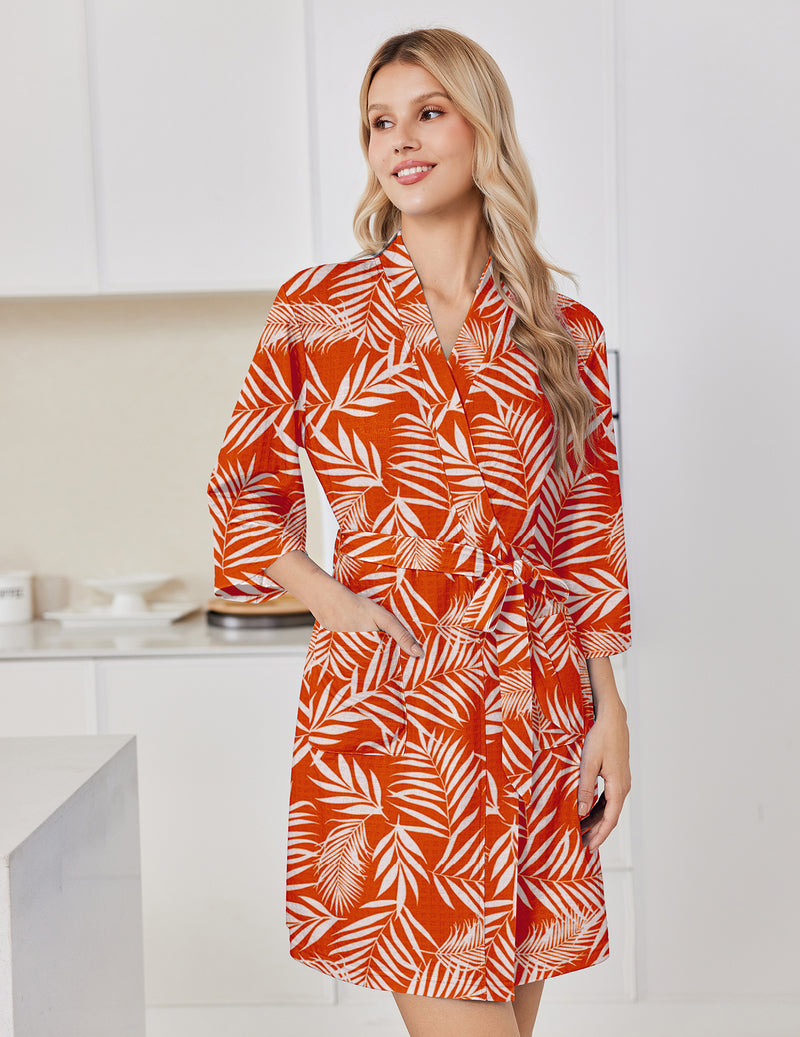 Orange leaf-print bathrobe with tie belt and three-quarter sleeves