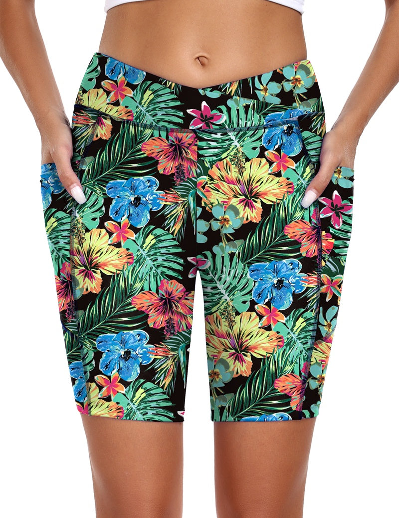 High waist board shorts with pockets in tropical floral print, mid-thigh length