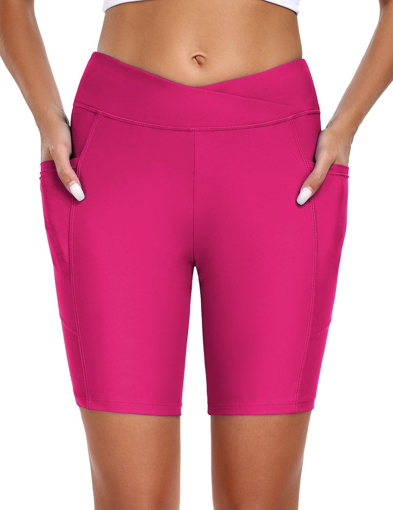 High waist board shorts with pockets in magenta pink, mid-thigh length