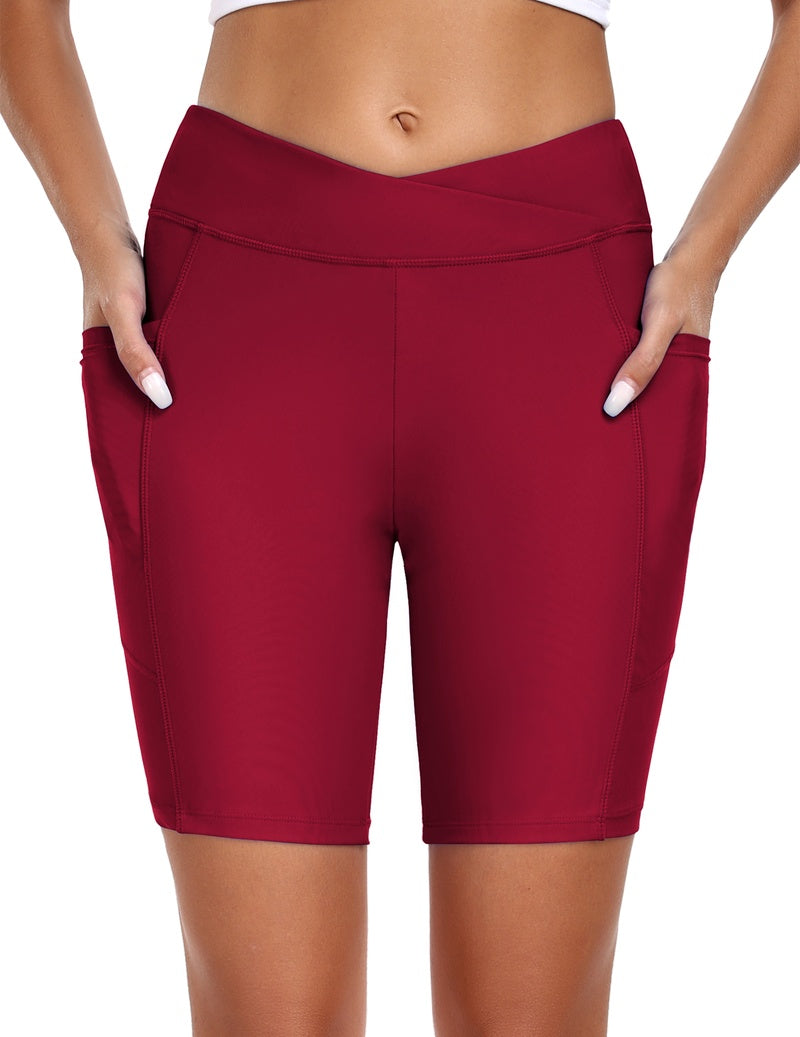 Burgundy high-waist board shorts with side seams and fitted waistband