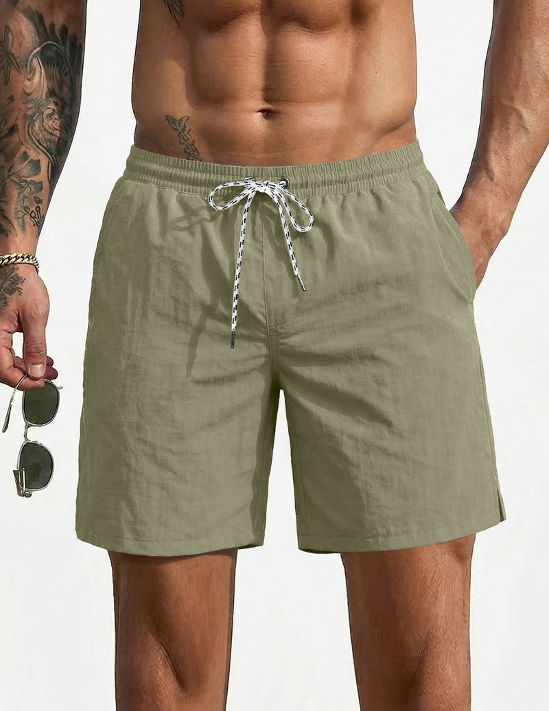 7-inch swim board shorts, olive green, elastic waistband with drawstring.