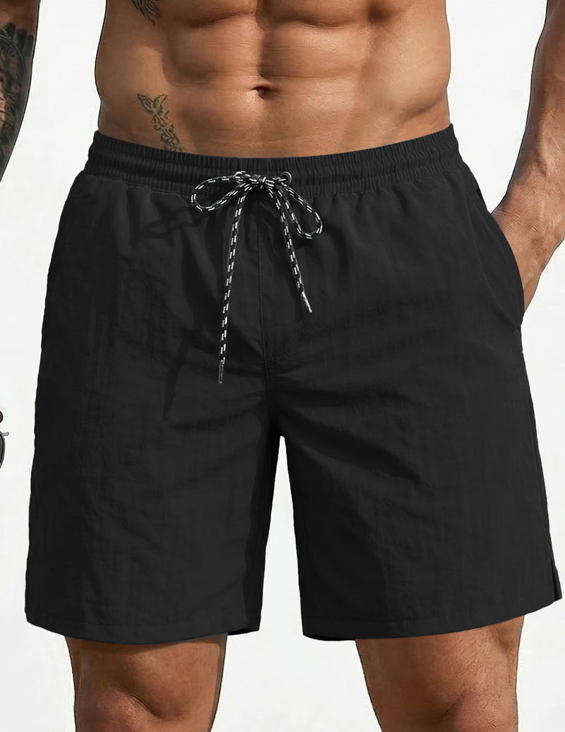 7-inch swim board shorts, black, elastic waistband with drawstring.
