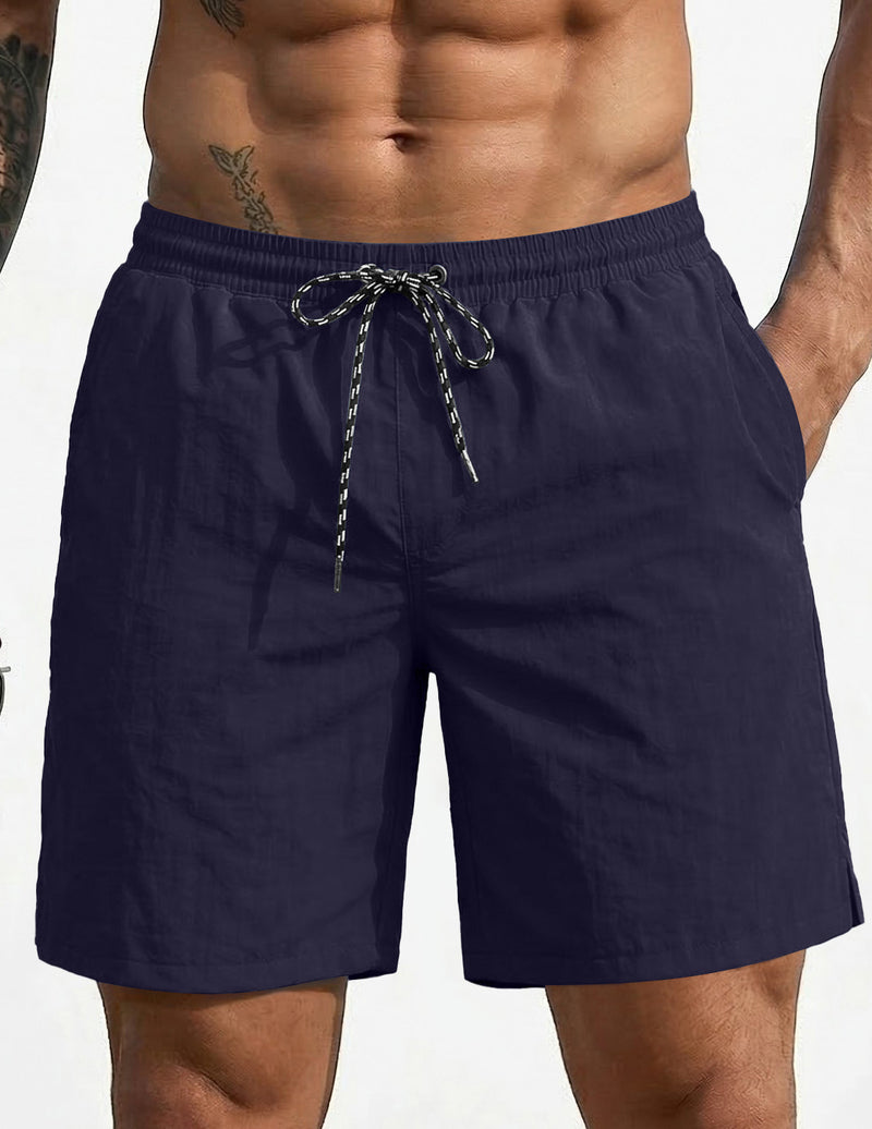 7-inch swim board shorts, dark navy, elastic waistband with drawstring.