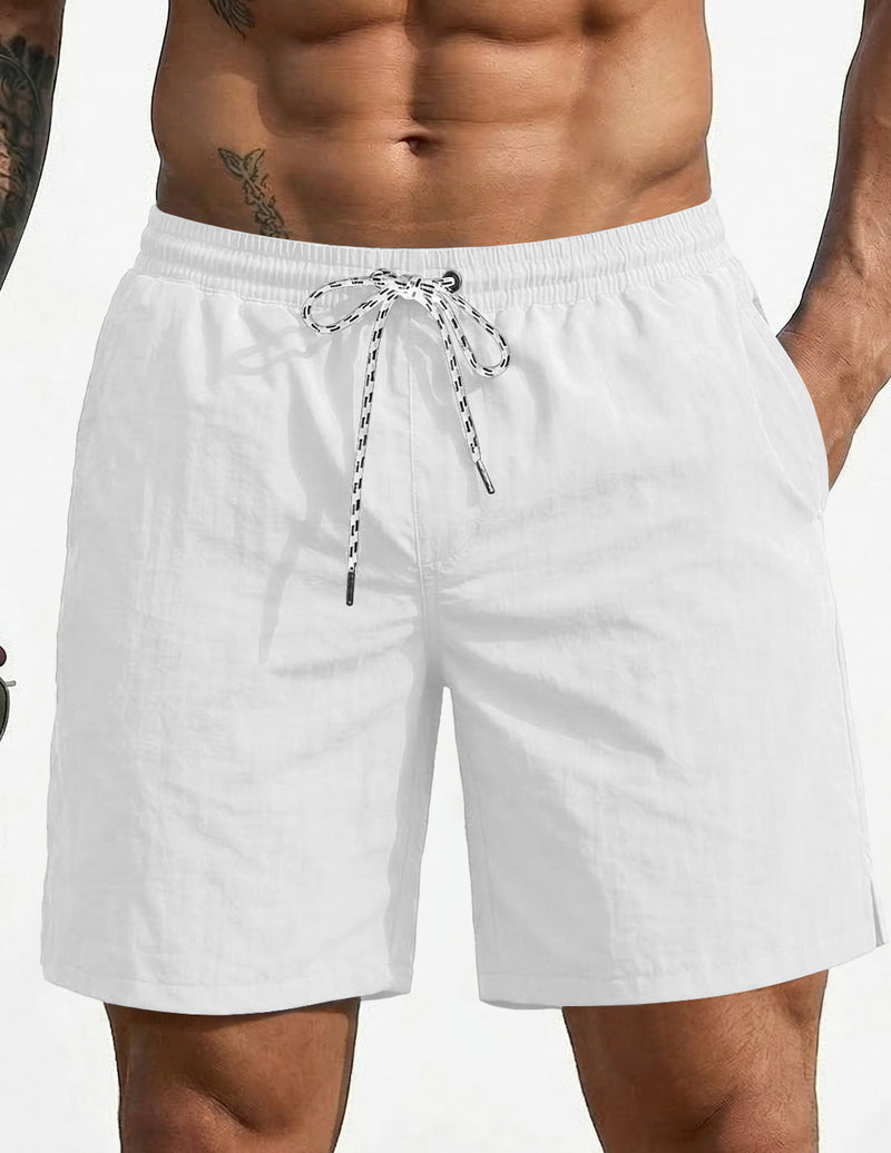 White swim board shorts with elastic waistband and drawstring, 7-inch length