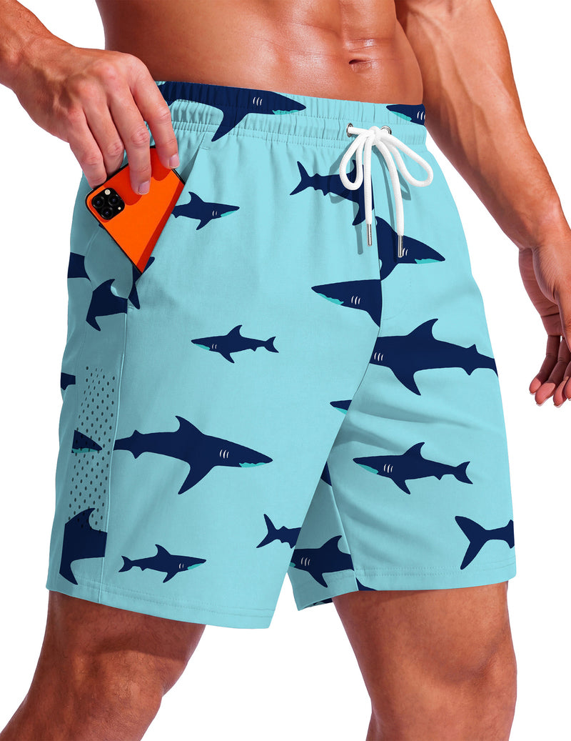 Light blue swim trunks with navy fish print, elastic waistband, and drawstring