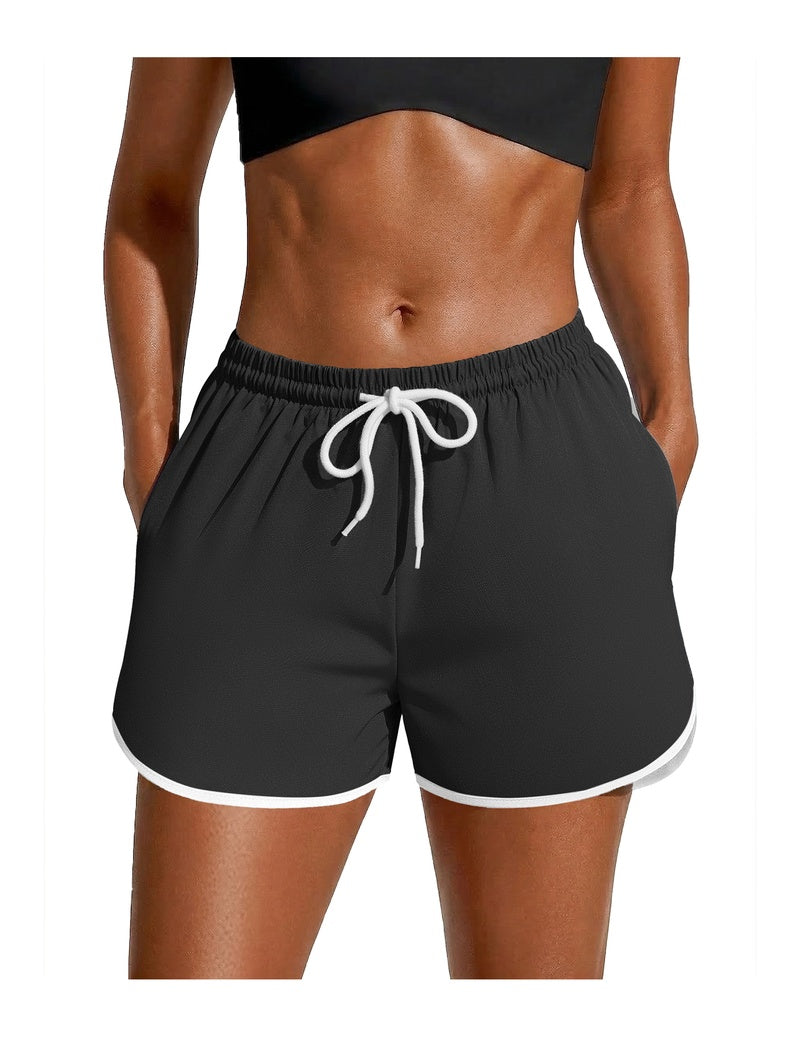 Black swim board shorts with white trim, elastic waist and drawstring
