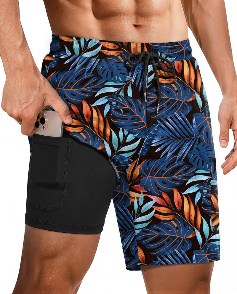 Blue and orange leaf-pattern swim trunks with drawstring and black compression liner