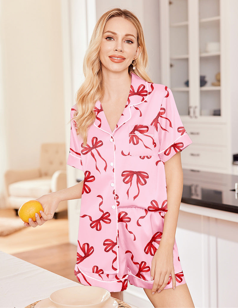 3-piece satin pajama set, pink satin button-up shirt with red bow print and shorts