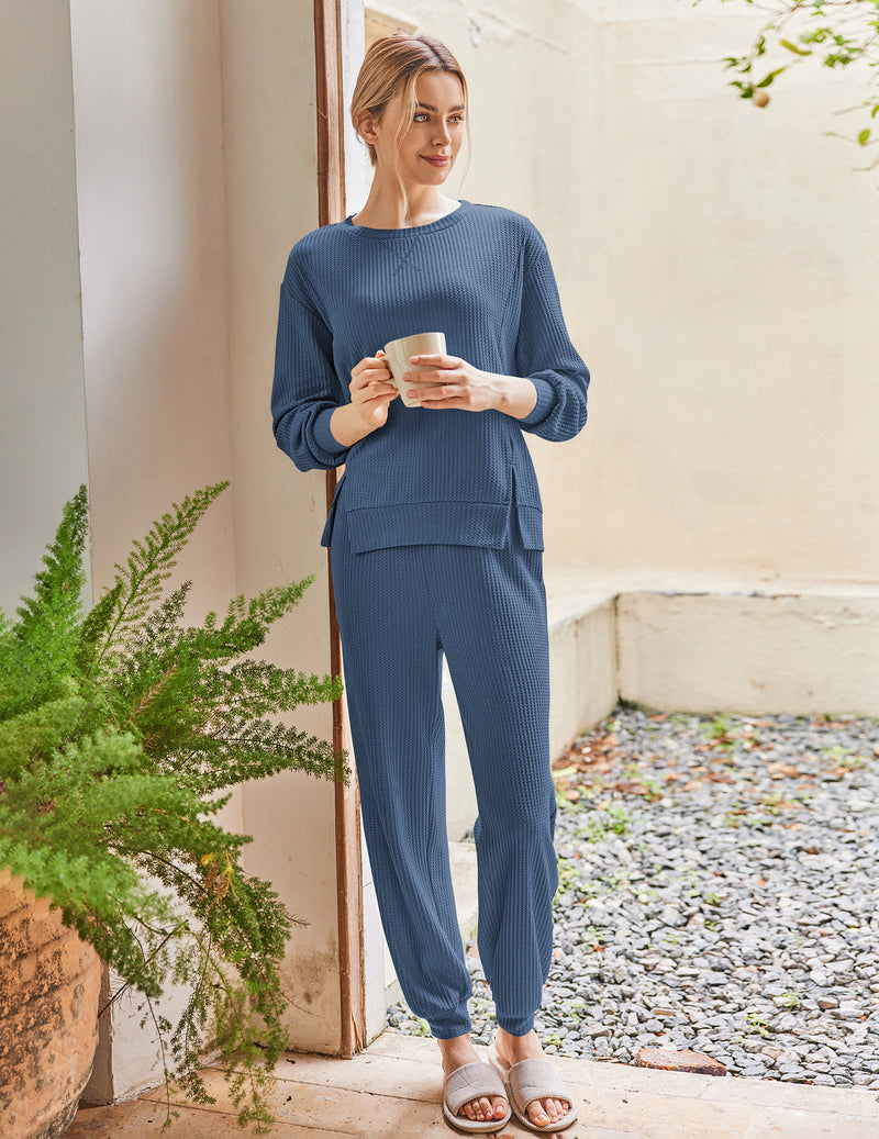 Blue waffle knit pajama set with long-sleeve top and matching pocket jogger pants