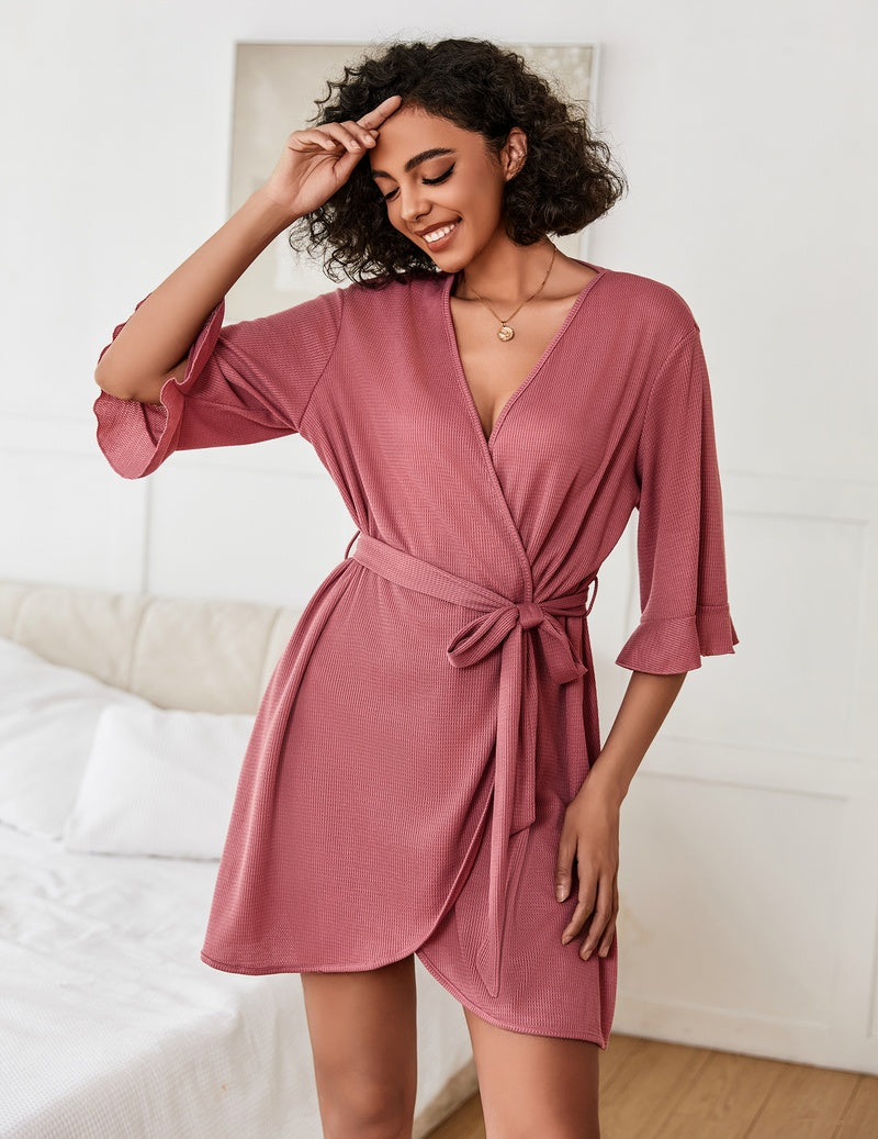 Mauve waffle-knit wrap bath robe with V-neck, ruffle sleeves, and waist tie