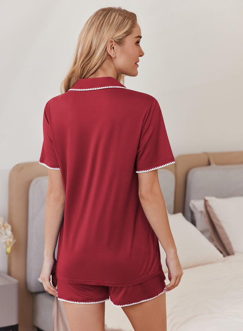 Back view of short-sleeve button-up pajama set in deep red with contrast trim.