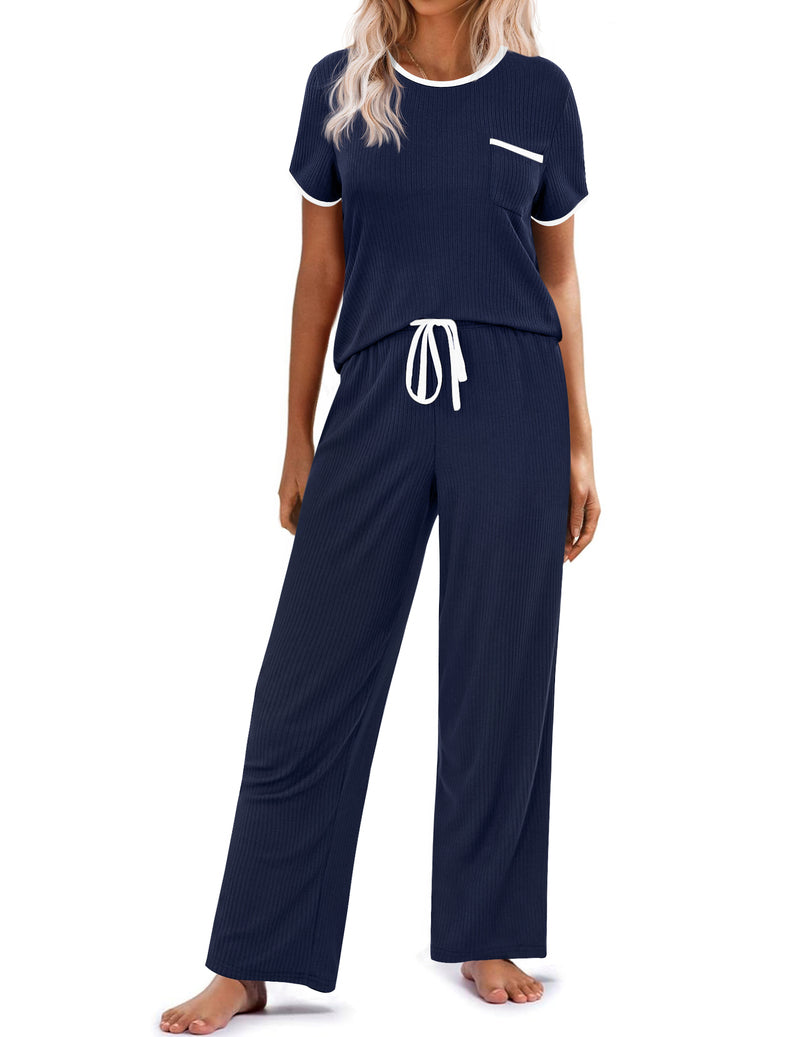 Ribbed knit pajama set in navy: short-sleeve top with pocket, drawstring long pants.