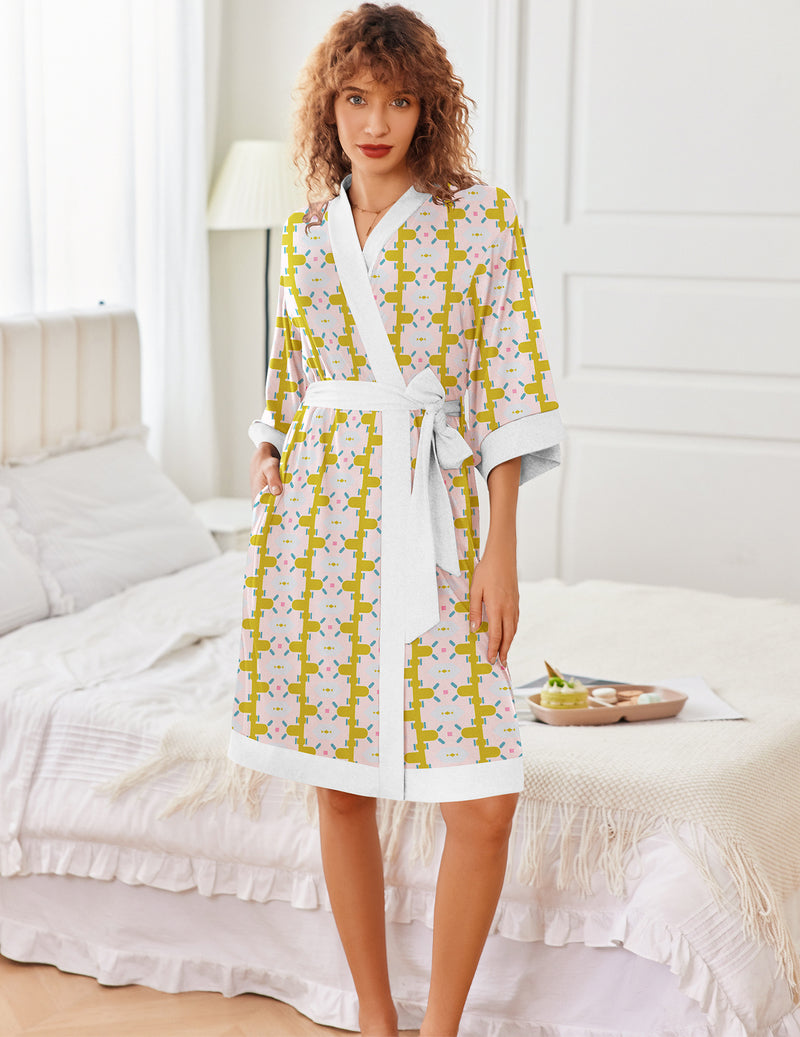 Lightweight knit kimono robe with white base and yellow floral print, tie belt