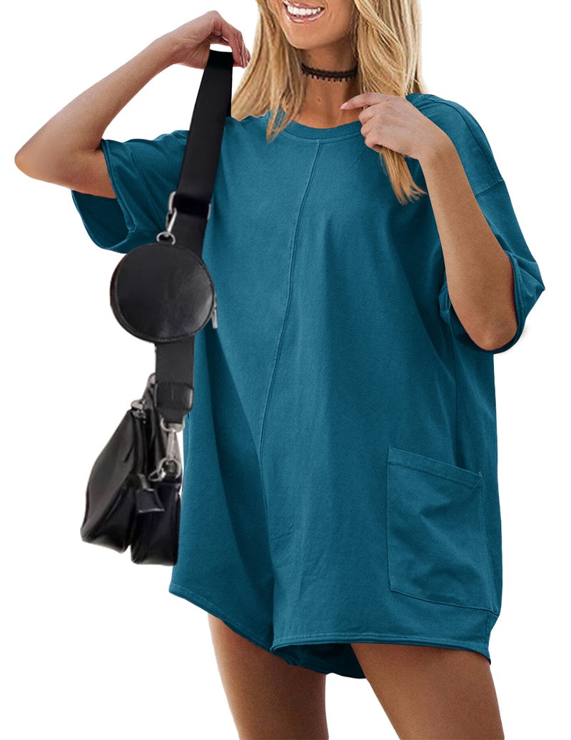 Teal reversible oversized romper with short sleeves and front patch pocket