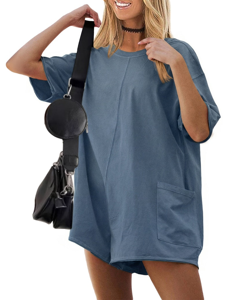 Dusty blue reversible oversized romper with short sleeves and front patch pocket