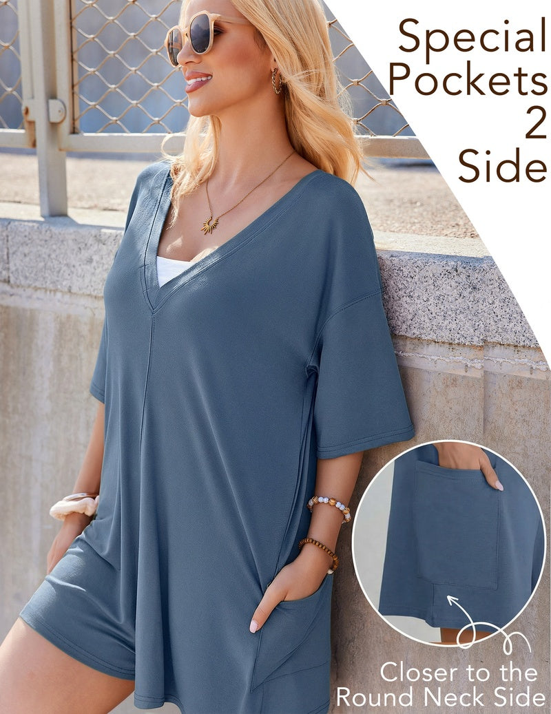 Steel blue reversible oversized romper with short sleeves and side pocket detail