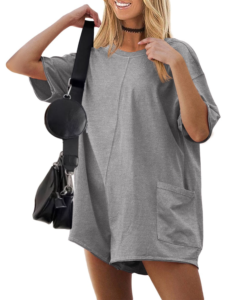 Light grey reversible oversized romper with short sleeves and front patch pocket