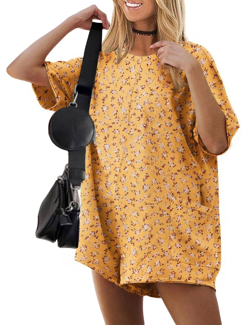 Yellow floral oversized romper with short sleeves, round neck, loose fit