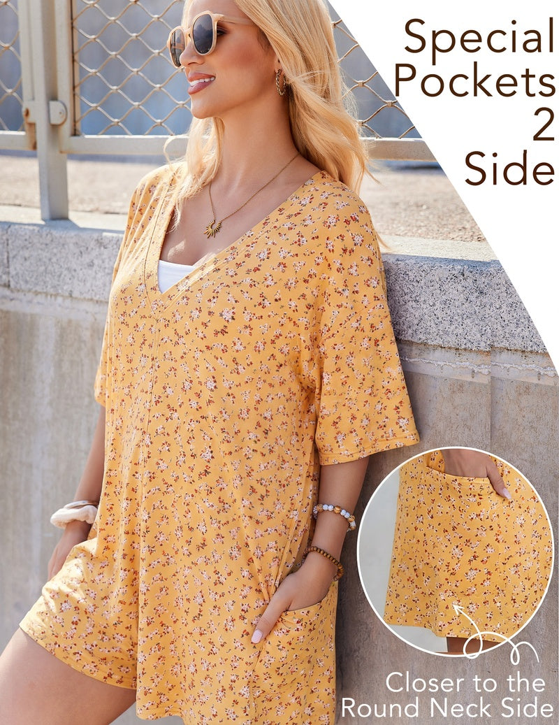 Mustard yellow floral oversized romper with short sleeves and round neck, loose fit
