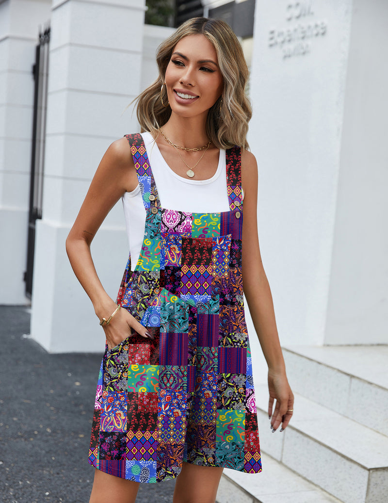 Sleeveless short overalls romper with colorful patchwork print, buttoned bib, two front pockets