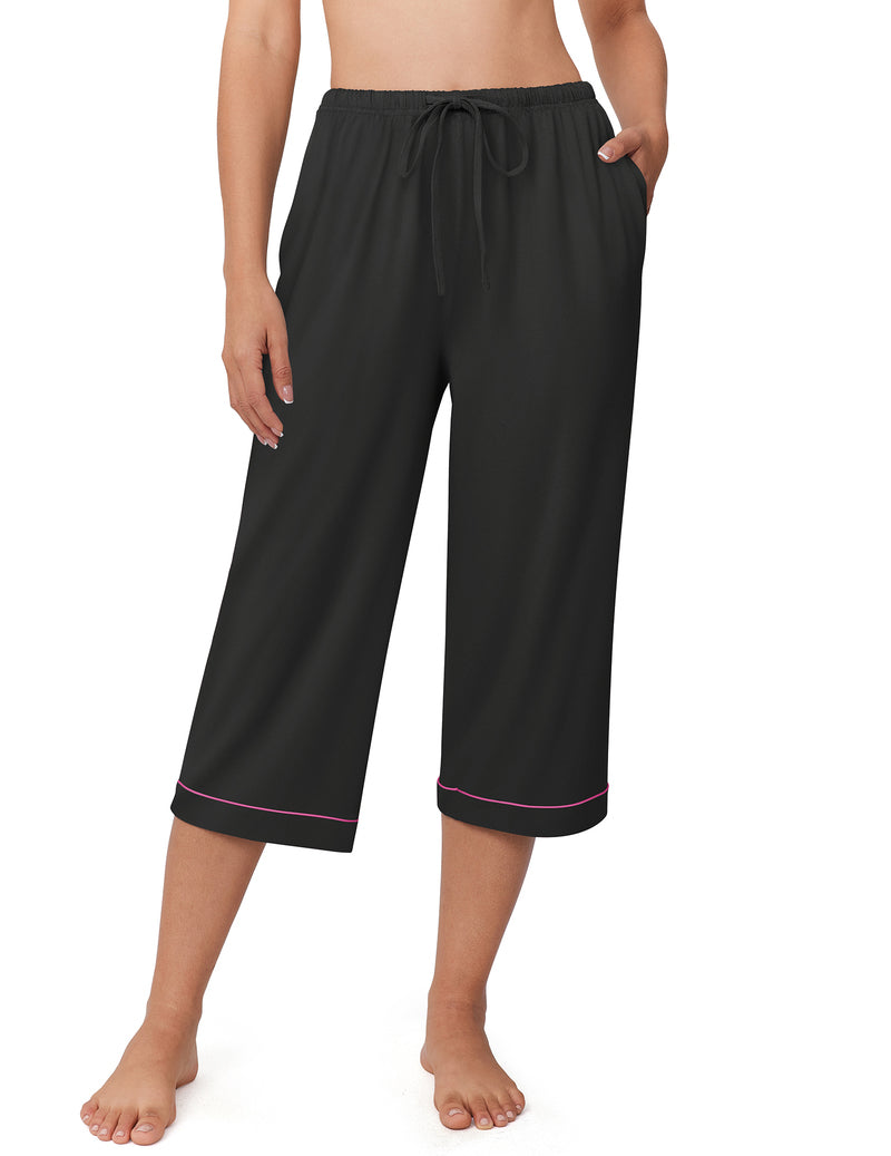 Capri pajama pants in solid dark fabric, elastic waist with drawstring, cuffed hem