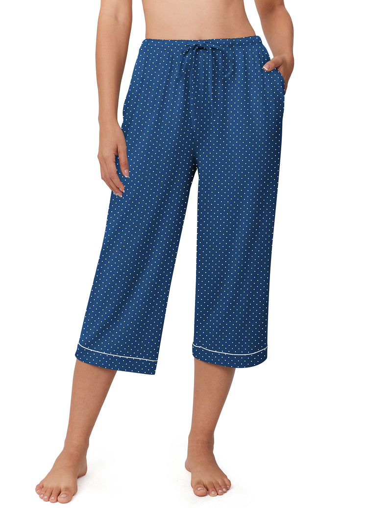 Blue capri pajama pants with tiny white dot print and drawstring elastic waist