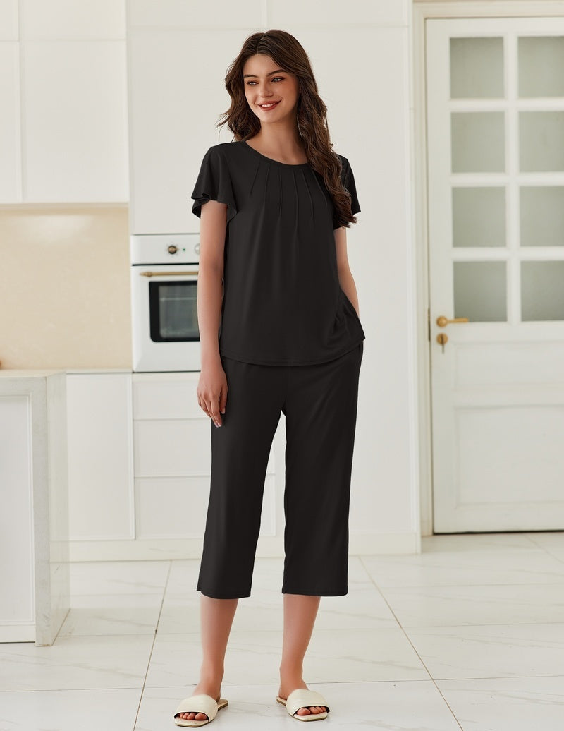 Black ruffle-sleeve pajama top and capri pants set