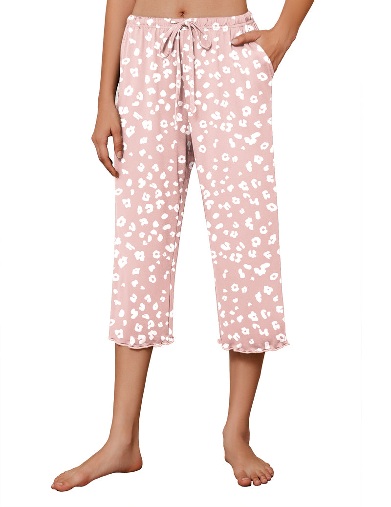 Light pink capri wide-leg pajama pants with drawstring waist and small allover print.