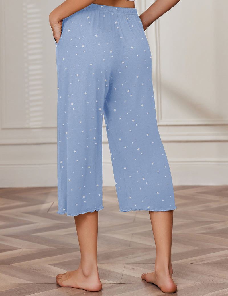 Light blue capri wide-leg pajama pants with drawstring waist and star print.