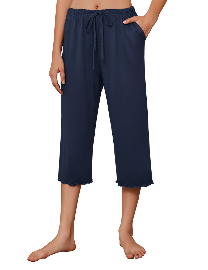 Navy blue solid capri pajama pants with wide legs and drawstring waist.