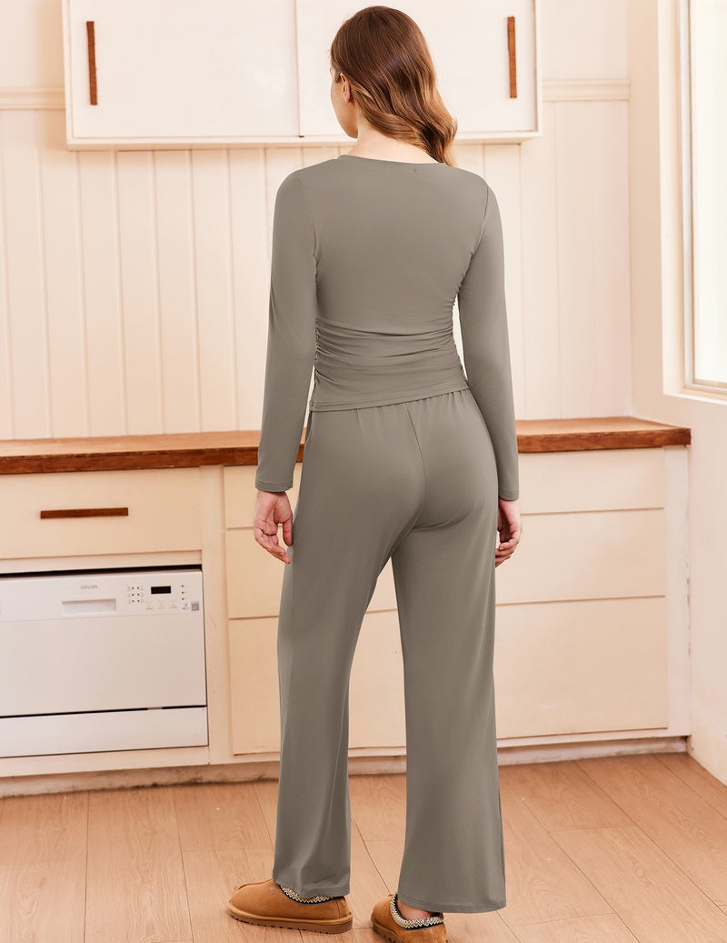 Back view of ruched long-sleeve top and wide-leg pants set in taupe-gray.