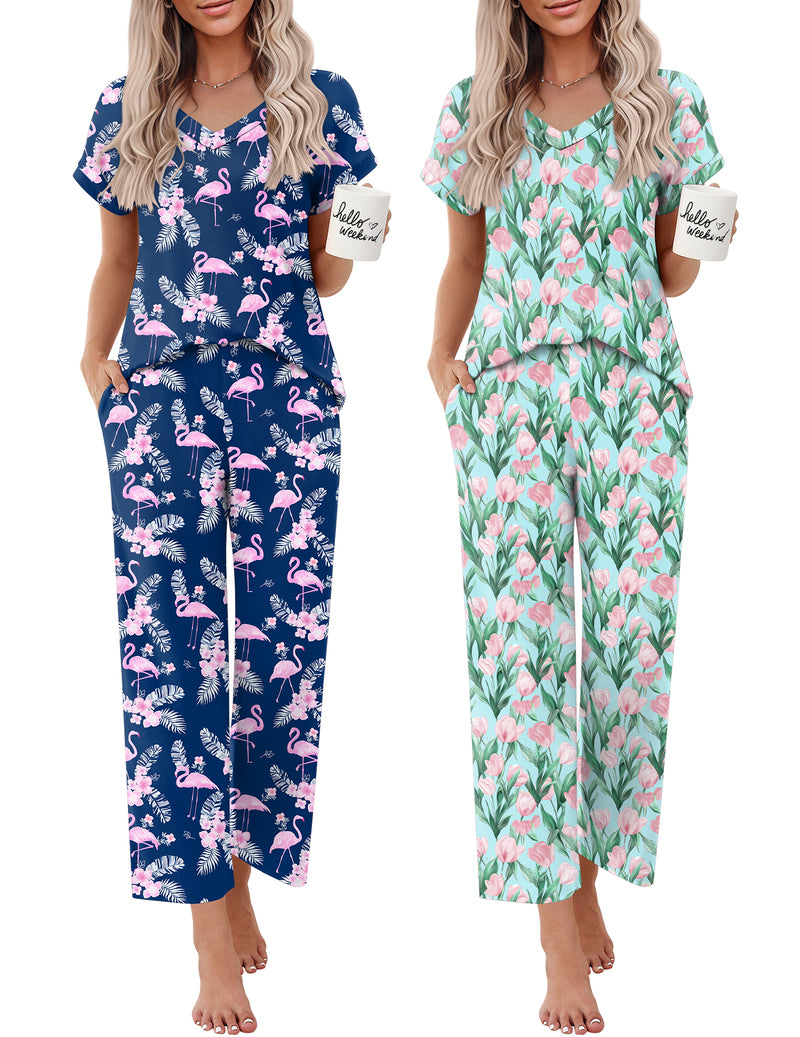 Two women’s short-sleeve V-neck pajama sets: navy flamingo print and mint floral print