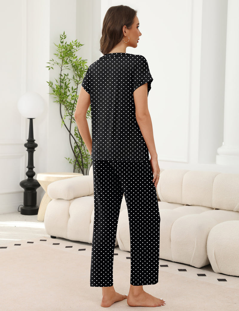 Women’s short-sleeve V-neck pajama set in black with small dot pattern, back view