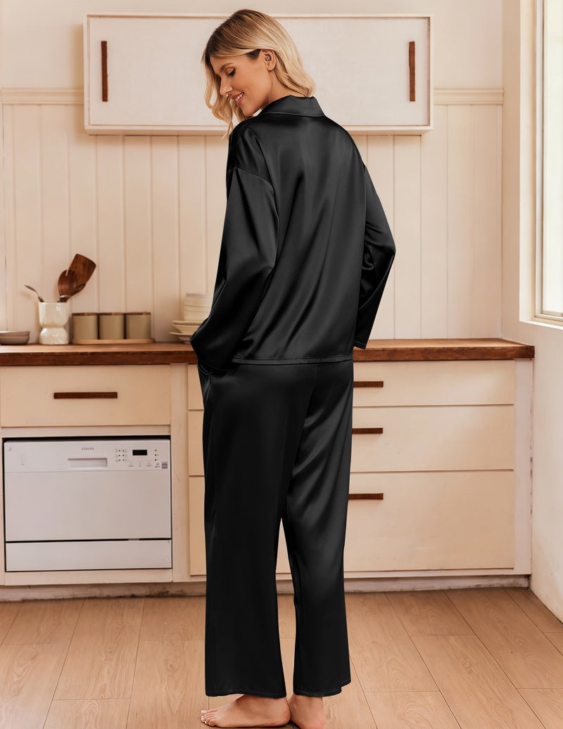 Black satin notch-collar button-up pajama set shown from the back with matching pants