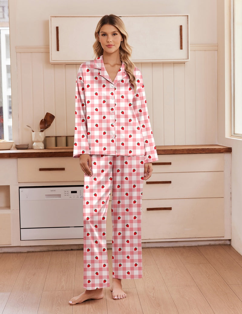 Pink satin pajama set with notch collar, button front, and long-sleeve matching pants