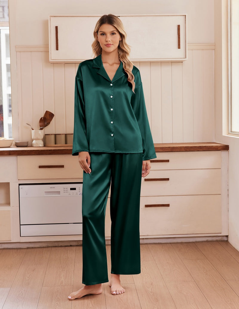 Dark green satin pajama set with notch collar, long sleeves, button front, and matching pants