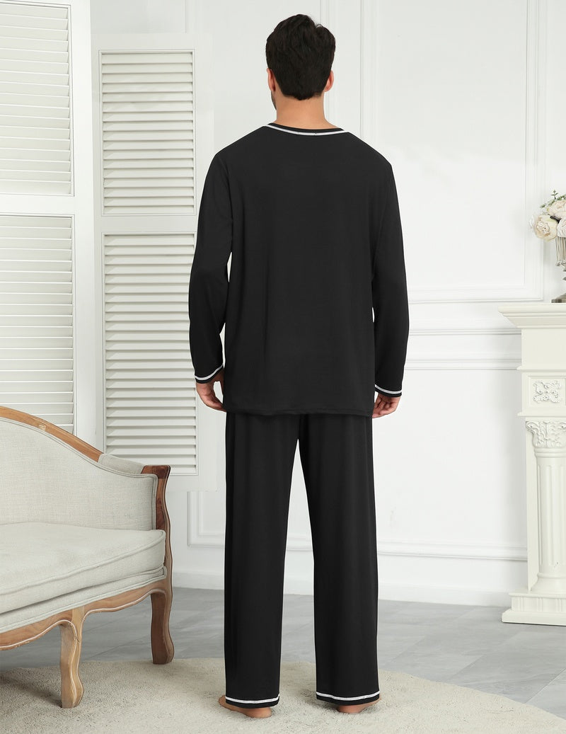 Men's long-sleeve pajama set in black, back view, with elastic waist pants