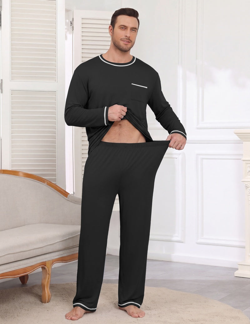 Men's long sleeve pajama set in black, crewneck shirt with pocket and elastic waist pants