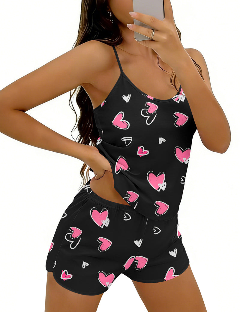 Criss-cross back cami pajama set in black with pink heart and bow print, matching shorts